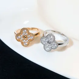 Anello di trifoglio a quattro foglie autentico versione ad alta versione, anello foglia di diamanti a diamante pieno in oro bianco, sensazione di fascia alta, in stile freddo e indifferente con anello logo