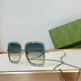 Moda de designer feminina Moda Sun Glasses Metal Frame Super requintada e atmosférica Cadeia longa G1033 Óculos de sol de luxo femininos com embalagem especial