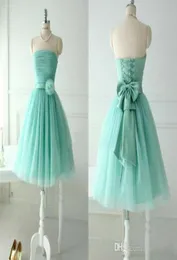 2019 Mint Green Bridesmaid Dresses Dresses Beach Aline Straplelle Tulle Short Homecoming Vestidos com Laceup Back e Flor Bow Short Summ7703188