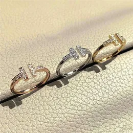 インターネットセレブの韓国語バージョン、軽い贅沢、ダブルTオープンカップル、ファッショナブルでシンプルで絶妙なダイヤモンドの象徴的な共同人差し指のリング、女性