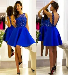 Fantastisk Royal Blue Sheer Short Prom Dresses spetspärlor ärmlös boll 2018 ALINE Billiga korta festkvällsklänningar Klänningar Robe D7225681