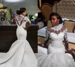 Kleider 2019 Luxury Mermaid Brautkleider schiere Langarm hoher Nackenkristallperlen Kapelle Zug Afrikanische arabische Brautkleider Plus Size C. C.