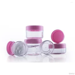 Speicherflaschen 50pcs 3g 5g 10g 15g 20 g leeres Cremesglas klare Plastikbehälter rosafarbene Kappe Flaschen Kosmetik Verpackung Topf nachfüllbare Glitzer nachfüllbar