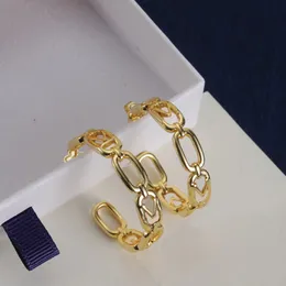 Designer di lusso Orecchini Huggie a cerchio d'oro 18K Fashion da donna Simple Round Orecchini per feste per matrimoni da donna Gioielli regalo di compleanno