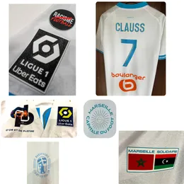 Home Textile 2024 OM MAILLOT NO Rassismus Fußball Clauss Mbemba Ndiaye Harit Ounahi Rongier Player Version Jersey mit vollem Sponsor Iron auf dem Fußball -Patch -Abzeichen