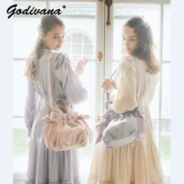 Japon tarzı çift taraflı çekme çantaları tatlı sevimli kız bayanlar saten yay crossbody omuz taşınabilir çanta 240320