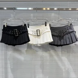 Юбки 2024 Весна Summer Super Short Short для женщин нишевая социалистская сплошная плиссированная мини -юбка