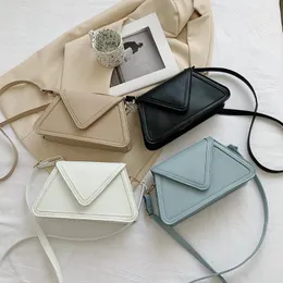 Bolsas de ombro bolsa de luxo 2024 Pu couro de couro sólido bolsa crossbody para mulheres Triângulo Invertido Casual Pequeno Bolsa