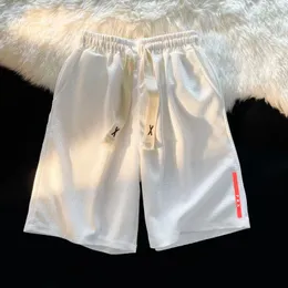 Shorti maschili semplici e versatili di colore solido, capris da uomo alle dimensioni allentate alla moda, pantaloni da spiaggia in pelle di marca alla moda estiva