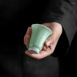 Tazze di piattini 2pc/set boutique fagiolo verde glassa in ceramica tazza da tè bagliore in pizzo bocchetto di tè da donna odore di tè da donna 50 ml