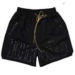 Shorts masculinos Rhude Designer Short Men Short Summer Secução rápida Mesh respirável Casa de praia de praia shorts esportivos soltos para homens 838