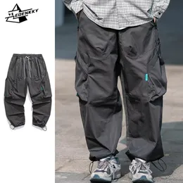 Japońskie duże spodnie ładunkowe mężczyźni amerykańskie spodni z High Street Spodery proste nogi dorywcze spodni unisex 240327