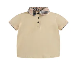 Tanda a quadri 2020 Vendioni Ins Summer New Style Kids School Styles Collari a quadri a pianta corta Polo di cotone di alta qualità Shirt 8550452