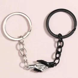 Keychains Lanyards Ny emalj Keychain dubbelfärg Handskakning Key Ring Magnetic Button Chains Friendship Gifts For Women Men Handgjorda smycken Q240403