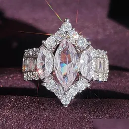 Bröllopsringar bröllopsringar 2023 choucong märke lyxsmycken 925 sterling sier marquise klippt vit topas cz diamant evighet kvinnor en dhp7g