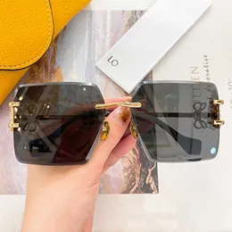 SS24 نساء نظارات شمسية مربعة بدون إطار HW2057 New Women Designer Metal Sunglasses أعلى جودة UV400 Lens Gold Metal Metal Greader Gold