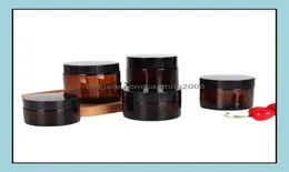 Butelki do pakowania Szkoła Business Industrial Brown Amber Glass Cream Butelka Jar Black Lid 5G 10G 30G 50G 50G 100G kosmetyki JA9531031