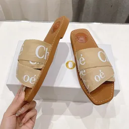 Luxury Sandals berömda designer kvinnors tofflor trä platt mule glidmila plattform moln mockasins broderade linne hög häl sandal espadrilles kil glider