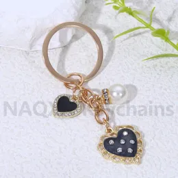 Schlüsselanhänger Pretty Heart Pearl Schlüsselbund Elegant Liebesflügel Key Ring Freundschaft Geschenk für Freundstaschen Dekoration handgefertigtes DIY -Schmuck Set