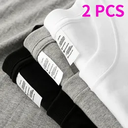 2PCS T-shirt stały kolor 100% bawełny mężczyźni kobiety białe o-dół luźne krótkie rękawy podstawowe modele T-shirt Para T-shirt Black 240325