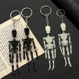 Chaços de chaves 1pc Luminous Skull Keychain Car Multi Joint Joint Gothic Horror Pingente Halloween Ghost Jewelry Casal Gift Q240403