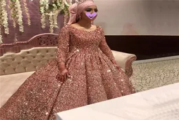 Vestidos de baile de ouro de ouro rosa muçulmano Mangas longas vestido de bola de lantejoulas Dubai Mulheres Reflexivo Partem