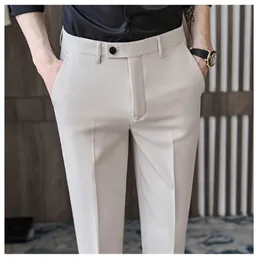 Pantaloni da uomo springsummer pantaloni per il lavoro, drop versioni coreane long coreano Slimt fit a piede dritto gamba abito j0005 240326