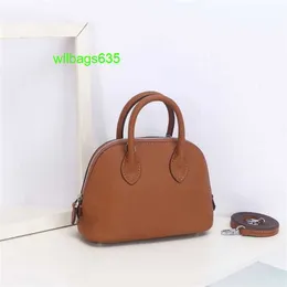 Bolsa de couro bolide bolsas femininas de luxo confiáveis 2024 nova camada de shell de 18 cm camada de cabeceira litchi padrão mini boliche bola de mão genui tem logotipo hb5gb6