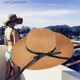 Szerokie brzegowe czapki wiadra proste żeńskie letni wizjerze czapka plażowa urocza łuk fala słoneczna kapelusz słomy kapelusz żeńska krem ​​przeciwsłoneczny f2 y240409