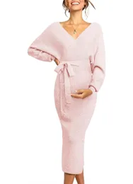 Womens Maternity A pink dress worn by a pregnant woman with long sleeves and a buttocks wrapped skirt 240408