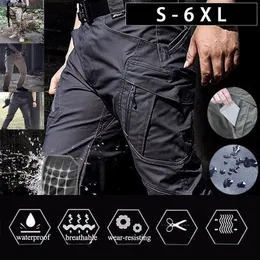 Pantaloni da carico tattici uomini combattono pantaloni militari dell'esercito a più tasche funzionanti da uomo casual pantaloni più dimensioni 6xl 240403