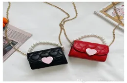 Children Pearl Chain Torebka Śliczna księżniczka Dzieci jedno ramię w torbie moda Baby Crossbody Bag Kobieta Mini Heart Hafted Wa1329154