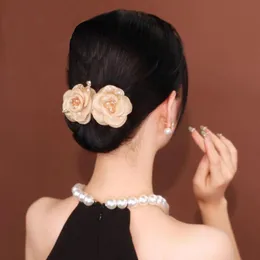 花の髪のパンメーカーエレガントな髪の髪のカーラー巧妙なパンクリップクリスタルヘアバンメーカー女子向けのツイスターバンヘアアクセサリー