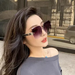 Frameless cut edge small fragrant style sunglasses for women with a high-end feel and UV protection. 2024 new trend shading gradient sunglasses