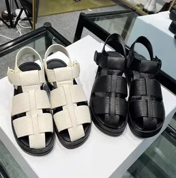 Ihålig vävd platt botten bulle romerska sandaler designer äkta läder anti slip casual mjuk sula med andningsbar rygg, mångsidig ryggsäck stil kvinnors sko band