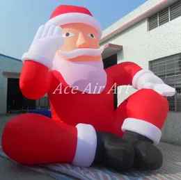 Wysokiej jakości 8 metrów wysokości Giant siedzący na ziemi nadmuchiwany świąteczny Święty Mikołaj do dekoracji lub reklamy w sklepie