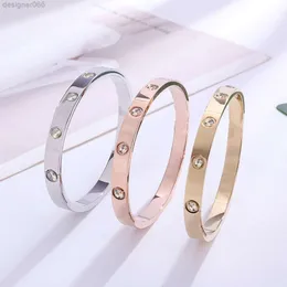 18k Bracelete de ouro rosa Feminino Versão coreana simples Pulseira de casal de aço de titânio fresco