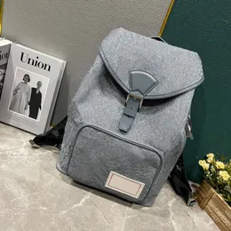 Designers de alta qualidade mochila saco de viagem Moda da moda Casual Denim Flower Backpacks Classic Leather Luxury Man Backpack Bag