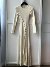 24 Spring/Summer New Bottom Hollow Curved Gold Button Knitted Dress