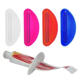 Titulares da escova de dentes dispositivo de creme dental multifuncional plástico dispensador de tubo fácil de rolamento de suporte de tubo rolante