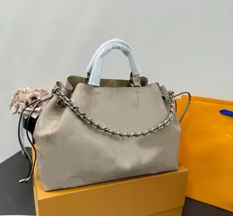 Designväska ny mode personlighet hink väska ihålig belle tote pendlare handväska stor kapacitet handväska crossbody väska