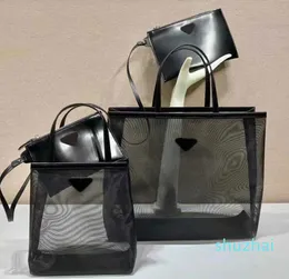 Bolsas de malha de praia Totes Bolsas de grife feminino Luxuris de luxuros de sacolas de malha maquiagem portátil de ombro único Bolsa de bola de praia Bolsa de lavagem feminina Bolsas femininas