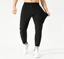 Hosen Männer Yoga Outfits Ealstic Taille Schnell trocken ausrichten Leggings Herren Gym Long Pant Running Joggers Fitness Basketball Slim Fit Pocke2842056