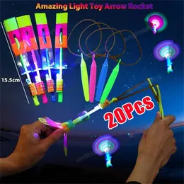 LED Flying Toys 1/5/10pcs Fantastisk Light Toy Arrow Helicopter Rotating LED Flying Toy Party Fun Gummi Band Catapult för barns 240410