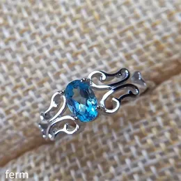 Clusterringe Kjjeaxcmy Feinschmuck 925 Sterling Silber Eingelegtes natürlicher blauer Topaz Ring ist glatt und kurvig mutig