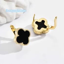 Fashion high-end temperament design four-leaf clover black and white four-lobe mosquito coil ear buckle earrings