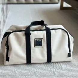 Yeni gelenler lüks moda duffel çanta tasarımcısı havaalanı çantası kadın çanta çanta tote en sıcak seyahat çantaları açık paketler büyük kapasite ve özlü mektup tasarımı