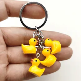 DHgate.com:Creative Resin Duck Keyring Set: 5 Mini Yellow