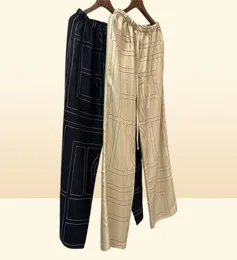 Toteme Pants Spring Fand Summer 100 Silk Logo Embroidery Casual Shinkstring Nighty Wide Leg негабаритный стиль 9899540