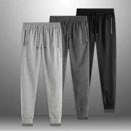 Pantaloni 3pcs/lotto pantaloni sportivi solidi uomini pantaloni della tuta da uomo pantaloni lunghi da jogger da jogger bottoms pantalone pantalone pantalone abbigliamento sportivo maschile 6xl